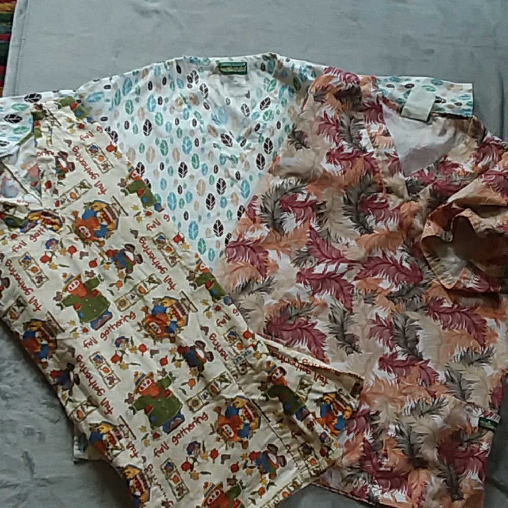 Set of three scrub tops size small except for the